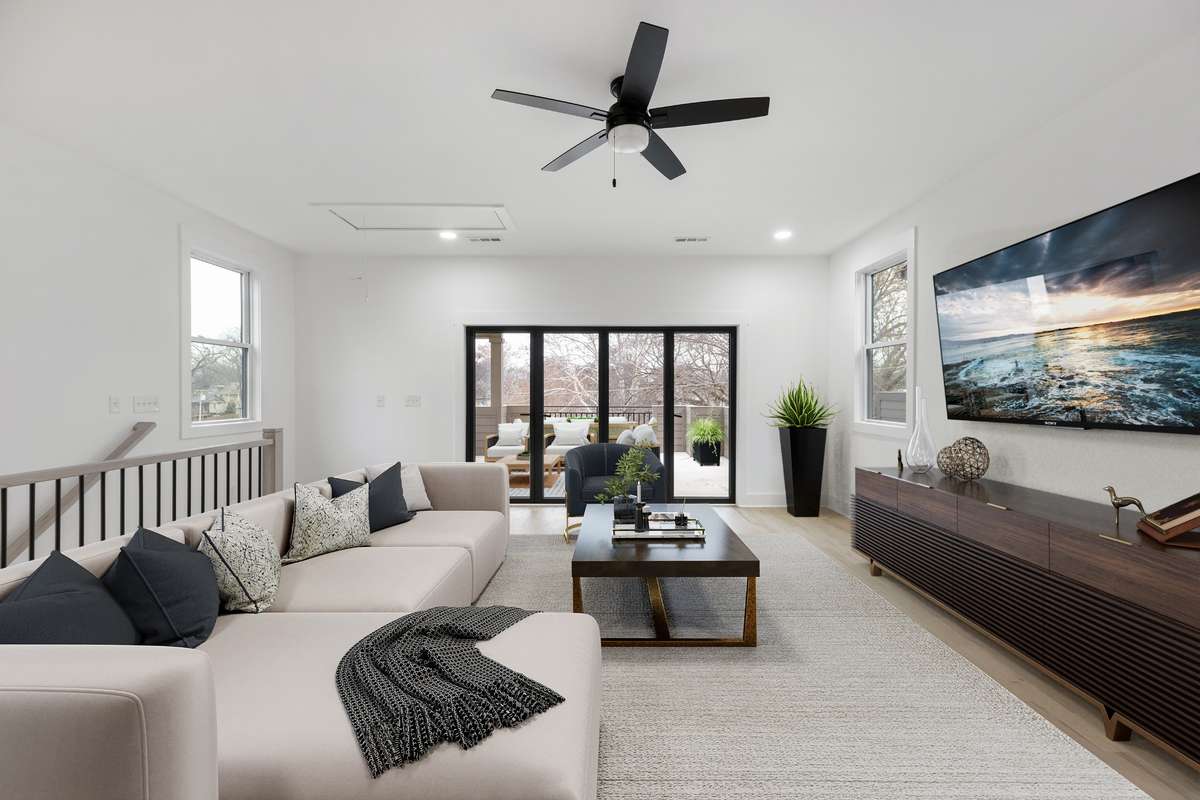 Virtually staged photo of bonus room on third floor