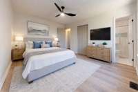 Main Bedroom — This photo has been virtually staged. Furniture and décor are digitally added and not included.