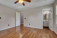 Another view of the Primary Bedroom which also features beautiful flooring.