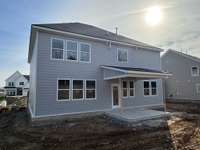 ***Photo taken on 12/13/25 to show the current status of construction***

Rear of Home