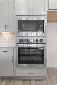 Gourmet kitchen with appliances built into the cabinet.