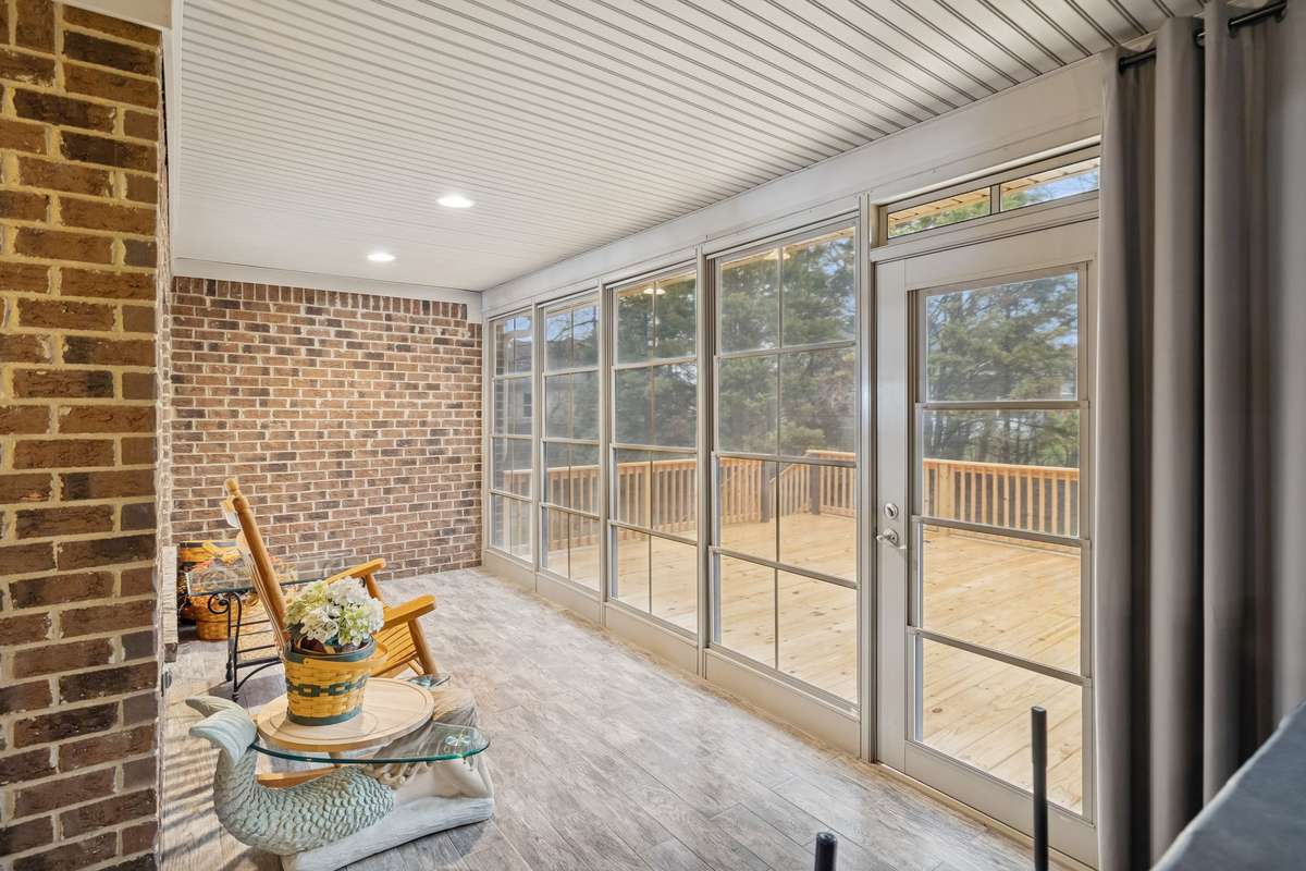 Enjoy the enclosed back porch year round!