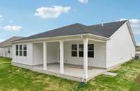 Darlington rear exterior. Photo is of similar home, same plan. Colors, interior selections, elevations, and upgrades may vary.