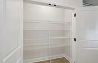 Darlington pantry. Photo is of similar home, same plan. Colors, interior selections, elevations and upgrades may vary.