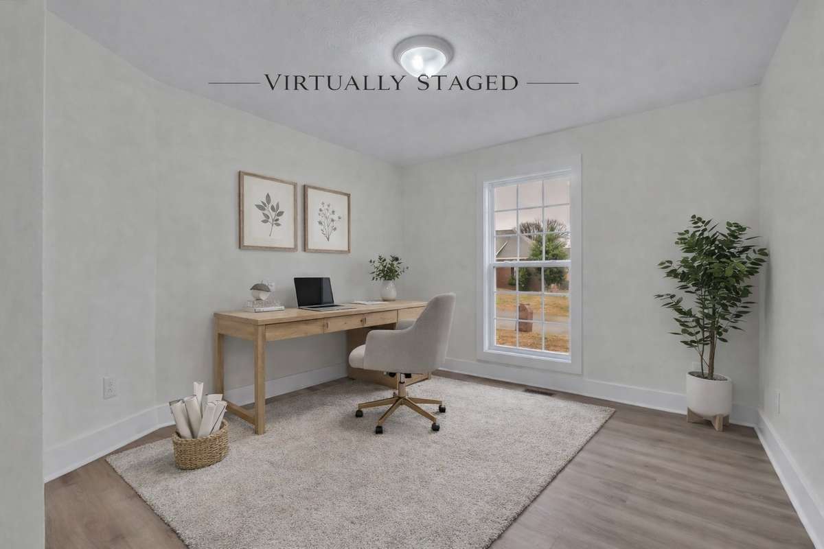 Versatile room ideal for home office, guest space, or additional bedroom.