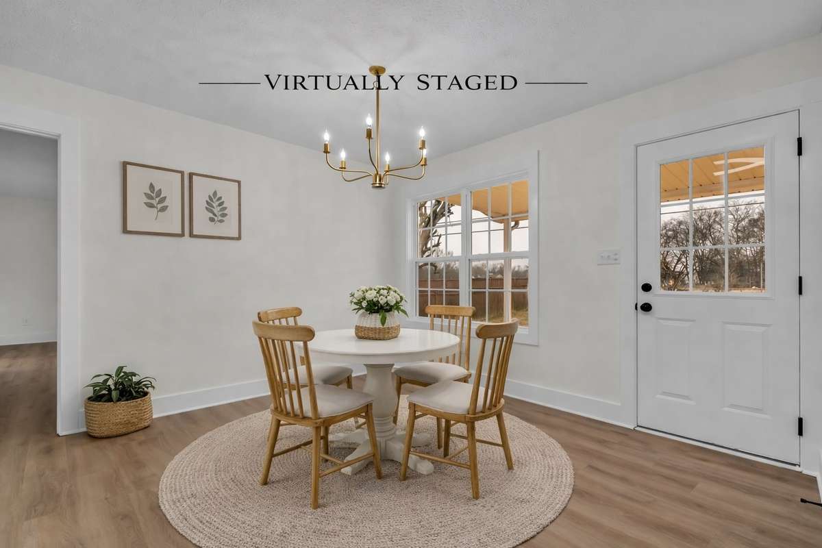 Cozy dining nook with great natural light and convenient flow to kitchen and deck.
