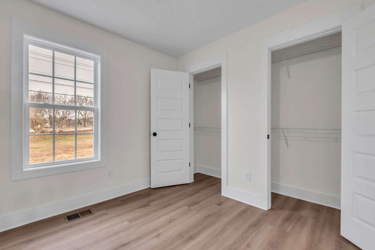 His and her closets in the primary bedroom.