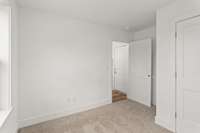 Another view of the secondary bedroom that offers endless possibilities of how you can use this space.