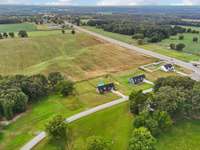 This beautifully positioned home sits on a generous lot surrounded by open countryside!  68 Taylor Rd. Manchester, TN 37355