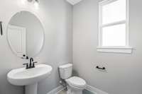 Picture of model home and not of actual home being built.  Colors and selections may vary!