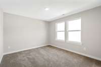 Picture of model home and not of actual home being built.  Colors and selections may vary!