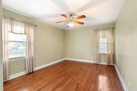 Master Bedroom with wood floors