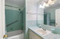 Hall bath that is set up for the handicapped holders