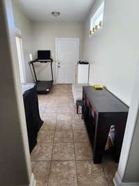 Florida room that can be used for pets, exercise, office, mudroom.....the list goes on!