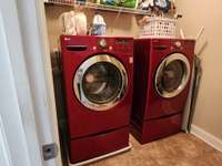 Laundry room is located upstairs with the bedrooms