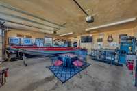 Step inside the detached garage designed to accommodate all your recreational and practical needs.