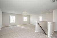 HUGE bonus room upstairs with large walk-in storage closet.  **All photos are of a previously constructed Covington floorplan.**