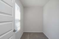 Large walk-in storage closet off of the bonus room upstairs.  **All photos are of a previously constructed Covington floorplan.**