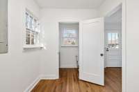 Plenty of room for extra storage as you go from the kitchen towards the back of the house.