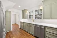 View of kitchen looking back into dining room