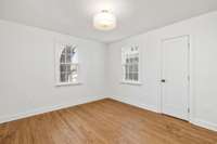 Upstairs bedroom is light-filled