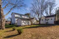 Nice level fenced back yard with room for garden, firepit, or play space.