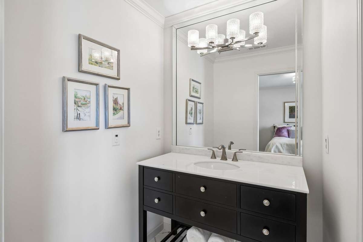 Ensuite with designer vanity.