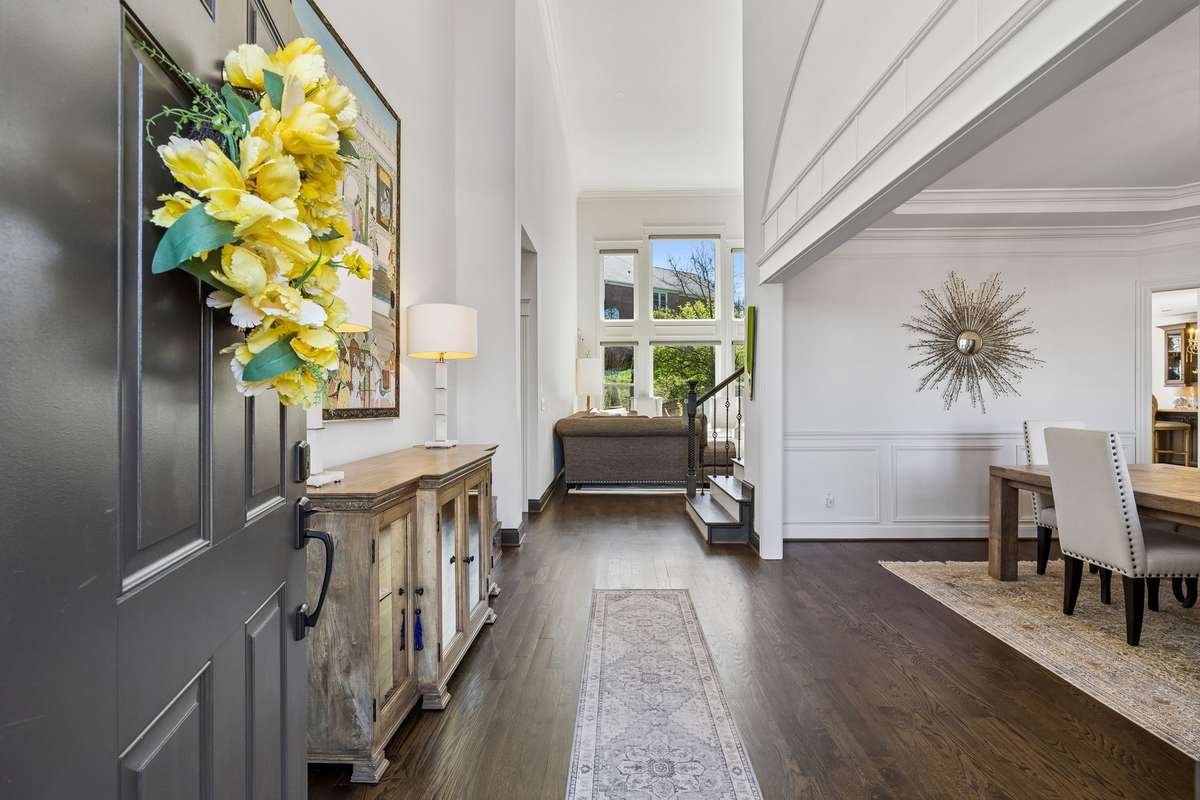 3/4 inch hardwood floors throughout are stained a walnut color.