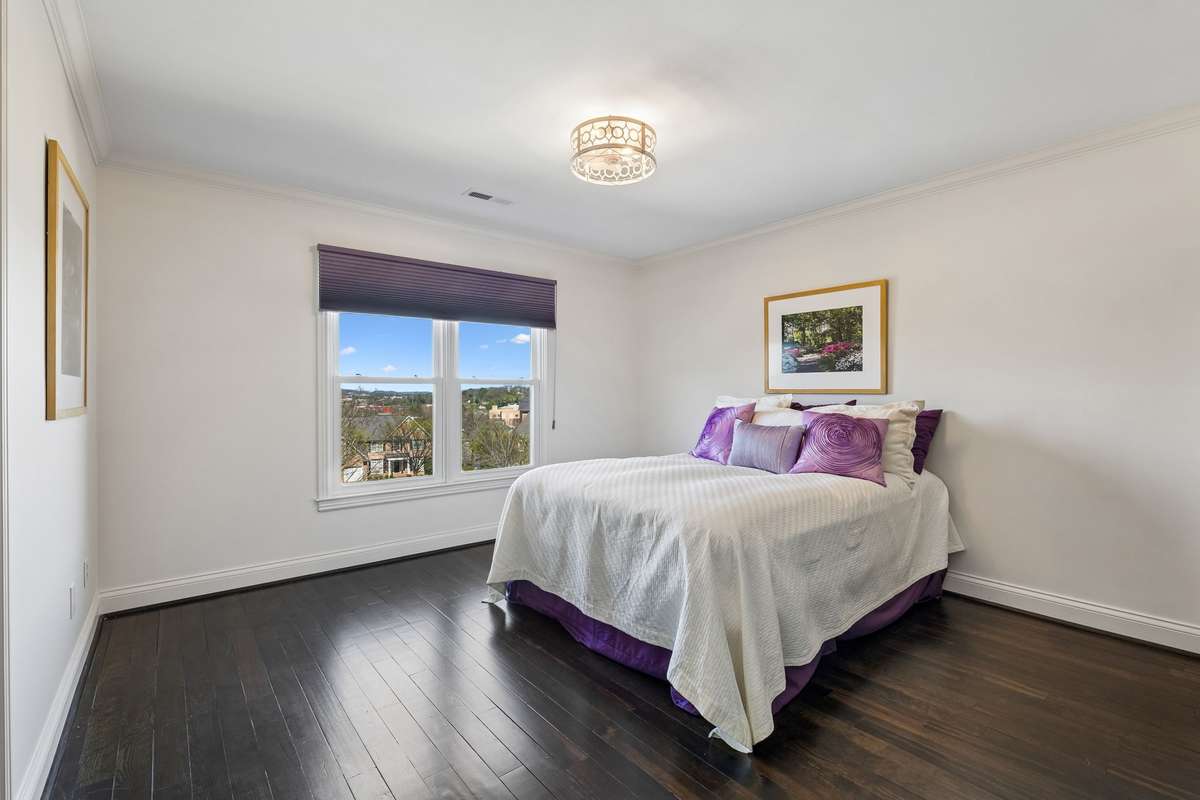Secondary bedroom #3 has ensuite. Custom double door closet with built-ins.
