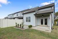 Covered back patio ready for entertaining