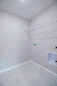 EXAMPLE>>>Spacious Laundry Room with Tile Flooring and Shelving!!