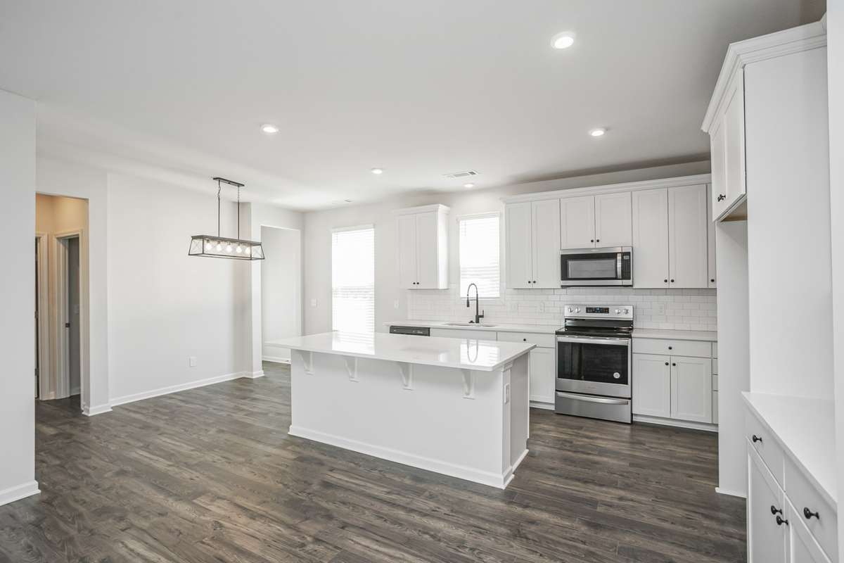 **All photos are of a previously constructed Covington floorplan.**