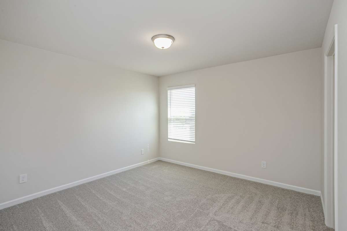 GREAT space in your secondary bedrooms upstairs. All 3 have nice closet space! **All photos are of a previously constructed Covington floorplan.**