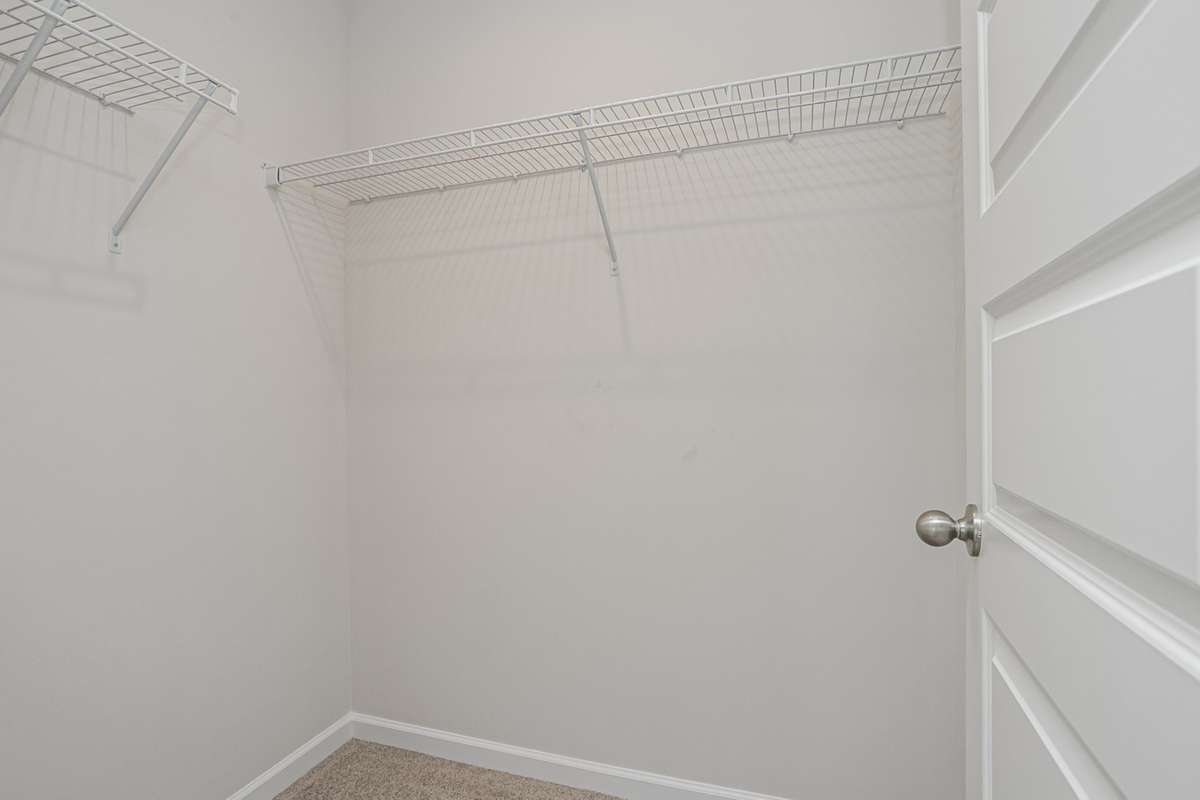 GREAT space in your secondary bedrooms upstairs. All 3 have nice closet space! **All photos are of a previously constructed Covington floorplan.**