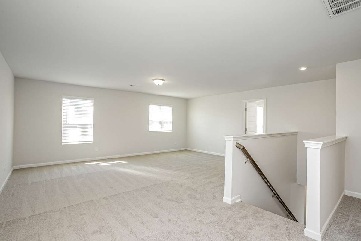 HUGE bonus room upstairs with large walk-in storage closet. **All photos are of a previously constructed Covington floorplan.**