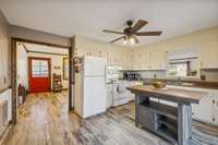 Front door and kitchen.