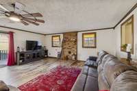 Family room with  area ideal for a future wood-burning or pellet stove