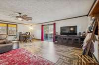 Family room with sliding glass door to wrap around porch.