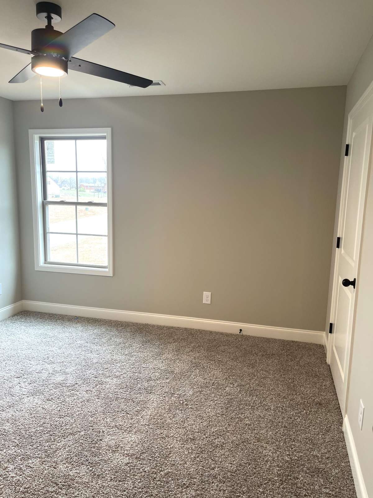 Bedroom 2...Has much needed Ceiling Fan...