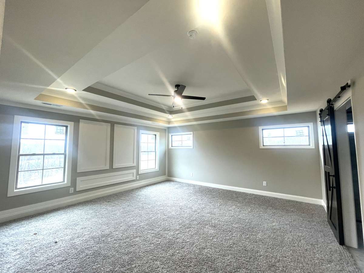 Owners Suite Features Custom Trim & Paint...What a Relaxing Hideaway....