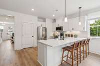 *Pictures of Model Home- Colors and Selections may vary*