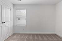 Secondary Bedroom
(photos are of a staged model home)