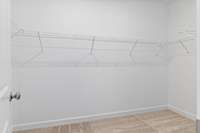 Owner's walk in closet
(photo is of a finished similar home- options and colors may vary in actual home)