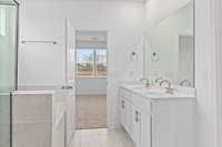 Owner's Bathroom
(photo is of a finished similar home- options and colors may vary in actual home)