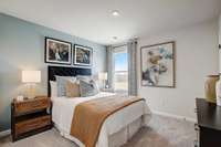 This is a photo of one of our model homes. Please know that some of the exterior and interior finishes, paint, and features may vary.