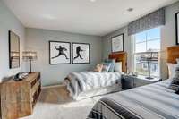 This is a photo of one of our model homes. Please know that some of the exterior and interior finishes, paint, and features may vary.