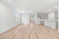 This is a photo of one of our model homes. Please know that some of the exterior and interior finishes, paint, and features may vary.