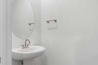 This is a photo of one of our model homes. Please know that some of the exterior and interior finishes, paint, and features may vary.