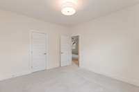 Another large bedroom on the second floor.