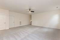 Second floor bonus room has access to a spacious storage area.